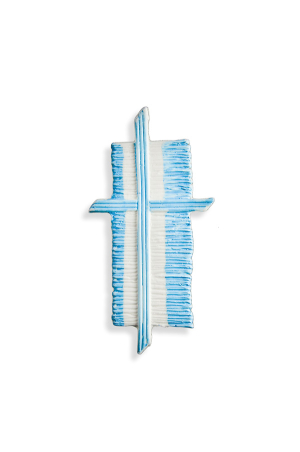 Wachsmotiv Kreuz hellblau auf gestaltetem Hintergrund